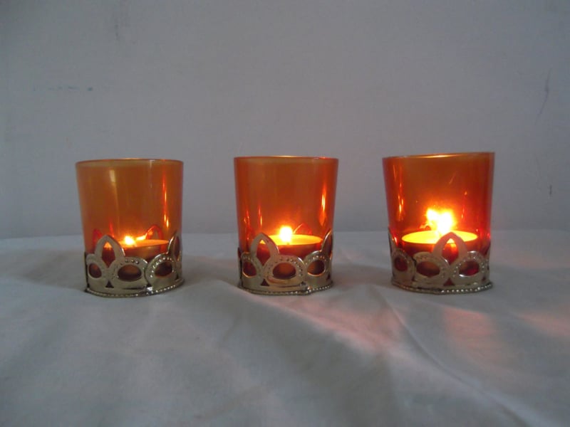 Set van 3 waxinelichthouders
[mwwsrc:1a7f06fd7f5203d1750cfd0eacf75bb8fe4f11e3.jpg]